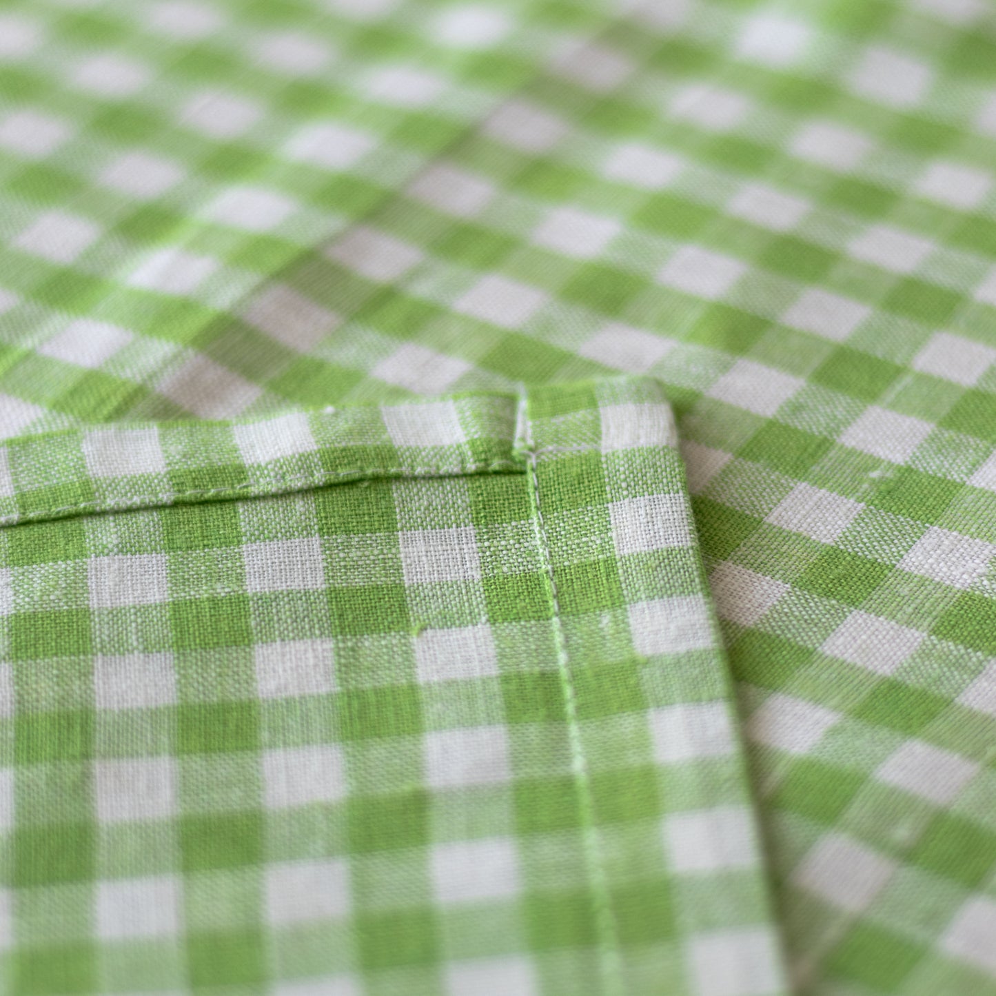 Linen table runner in green plaid