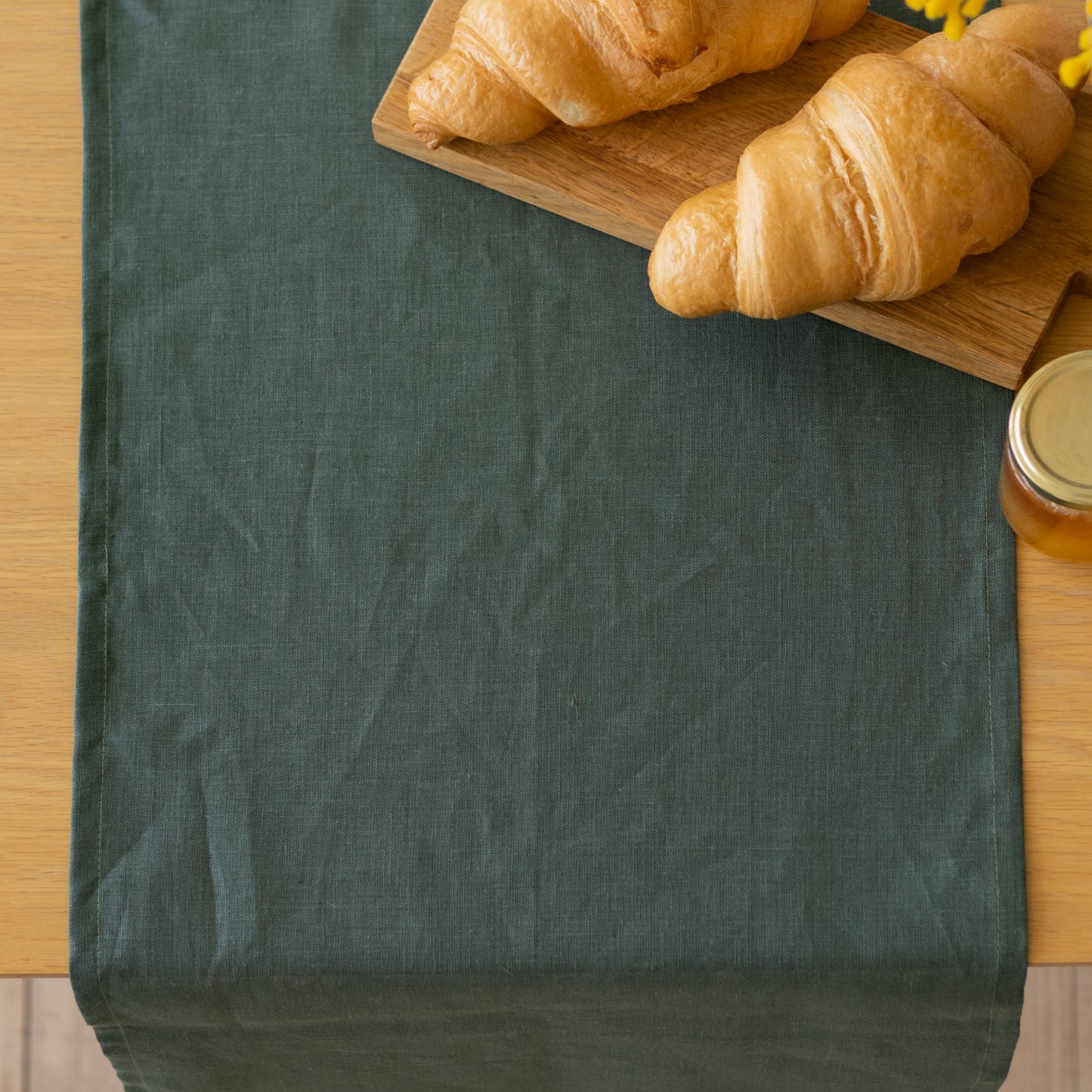 Green table runner in 100% linen