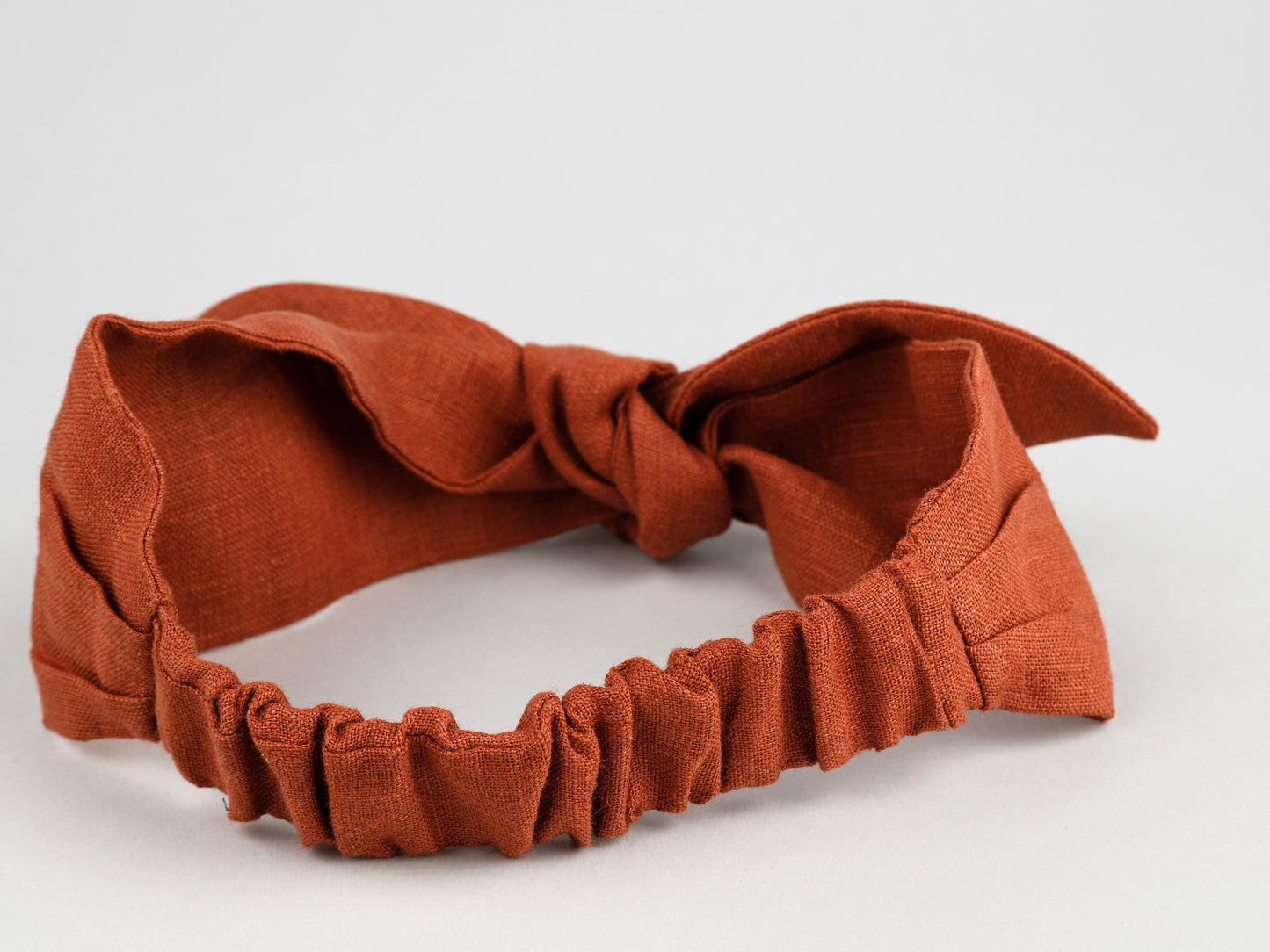 Linen headband in terracotta